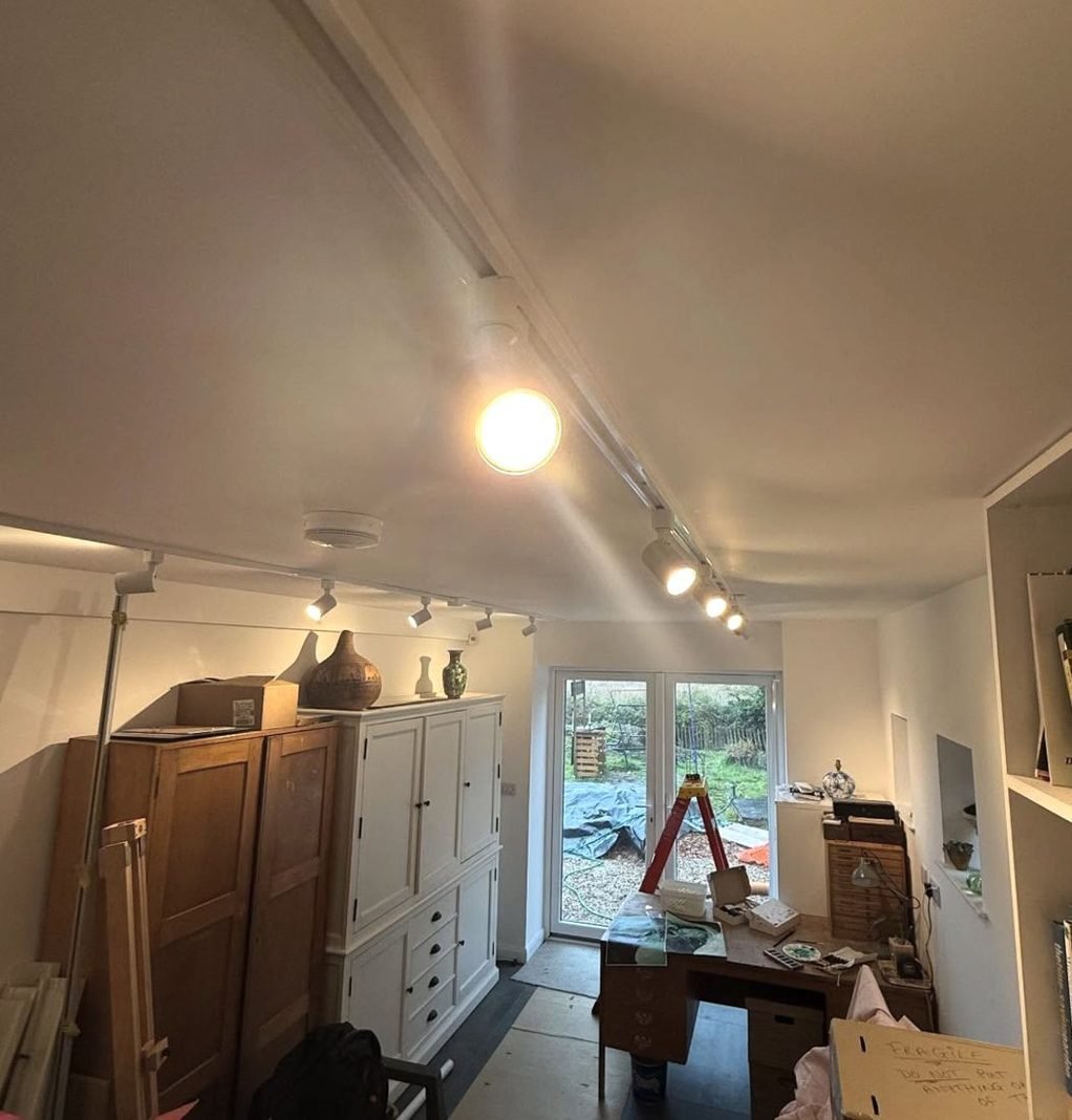 Track spotlights in a workroom